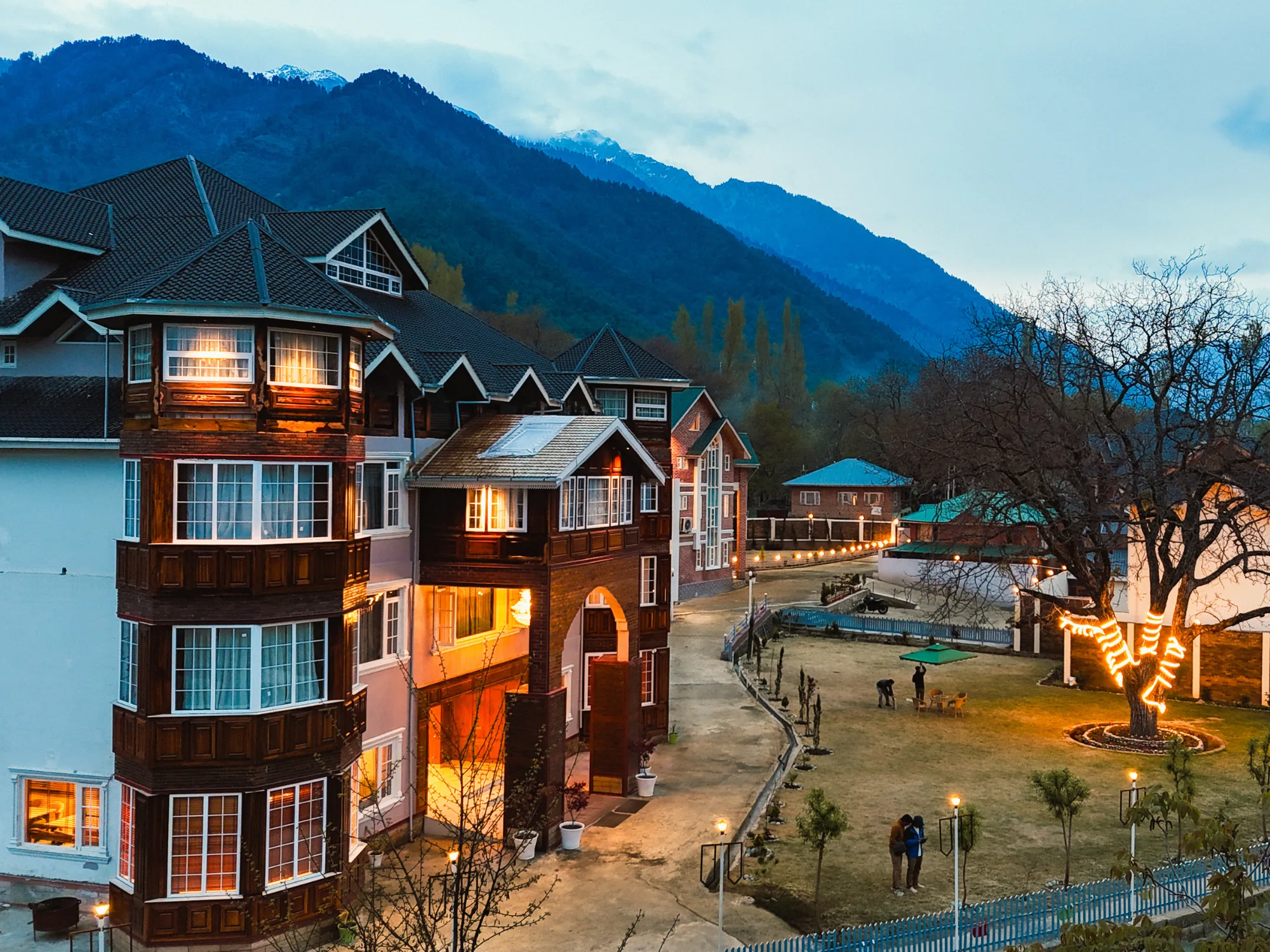 Faiz Resort exterior with mountain backdrop